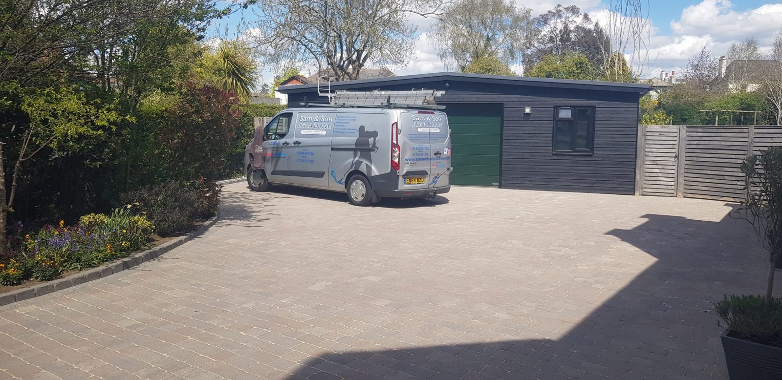 Driveway cleaned and treatment applied