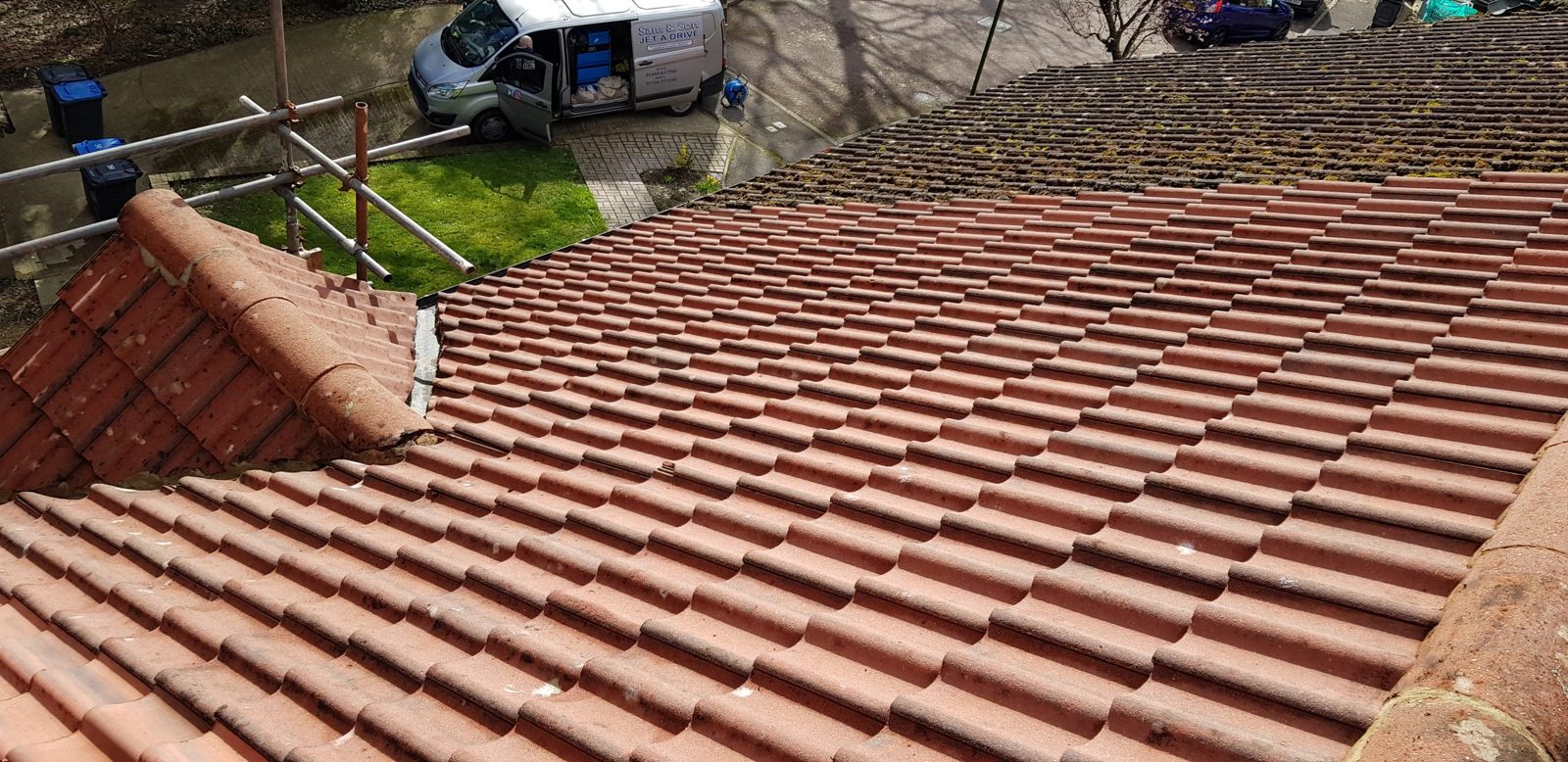Roof cleaning and treated with an antifungal mosque wash in Haywards Heath Victoria Road