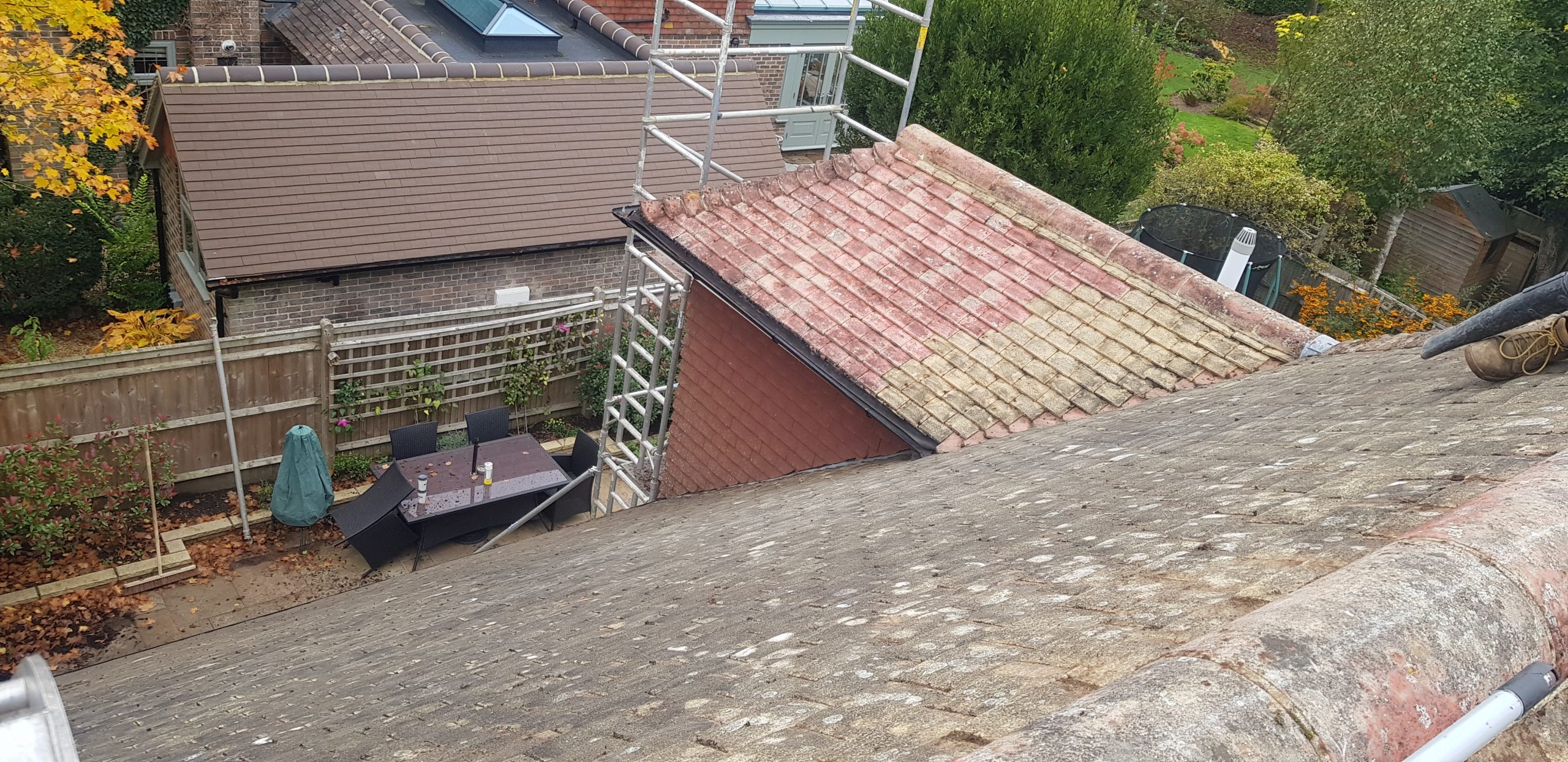 Roof cleaning and treated with an antifungal moss wash Sam and Son