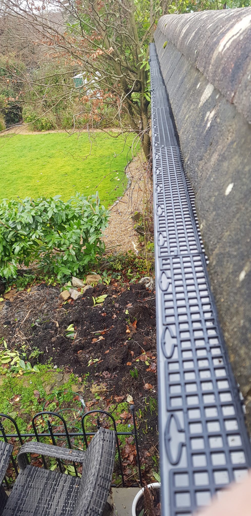 Gutter cleaning and also gutter grids installed in Cuckfield Sam and